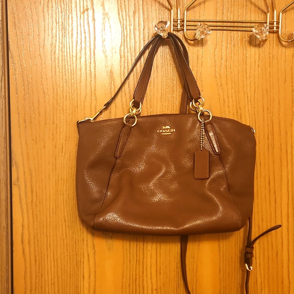 Brown medium Coach purse.